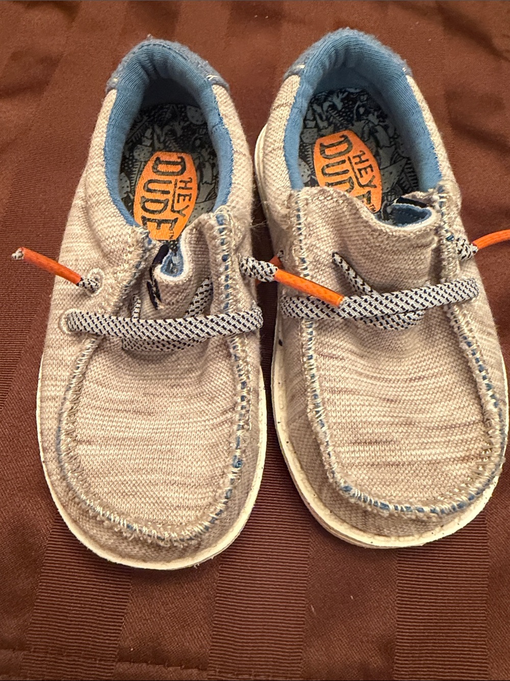 Hey Dude Kids Beige Canvas Slip-Ons with Blue Lining and Orange Accents